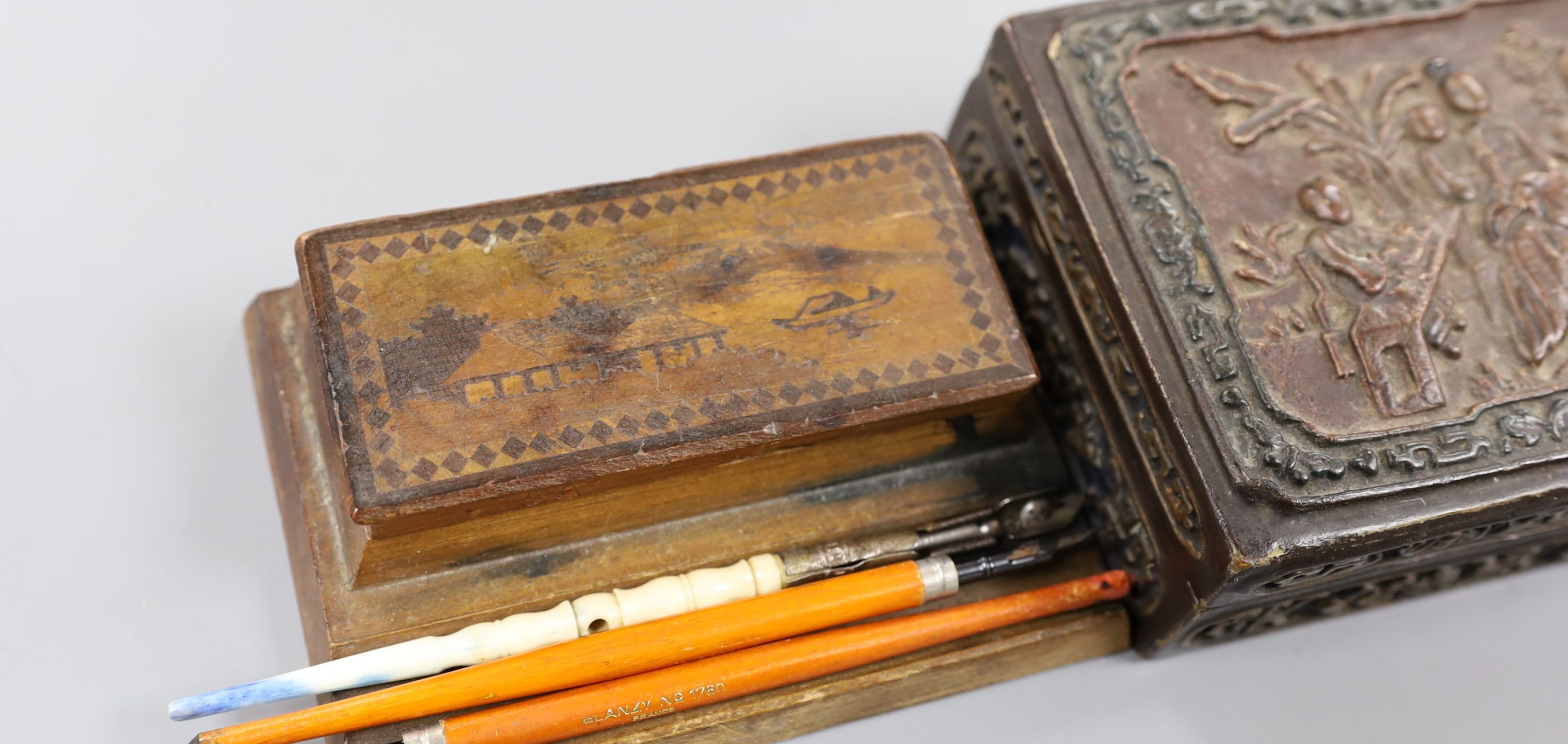 A Chinese rectangular lacquered composition box, an inkstand, three knib-pens and knibs